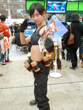 Illustration for article titled 2009's Cosplaying Arcade Game Booth Companions